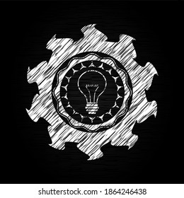 Ideensymbol in der Tafel Emblem auf schwarzem Brett. 
