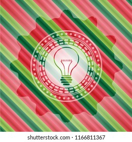 idea icon inside christmas badge.