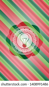 idea icon inside christmas badge.