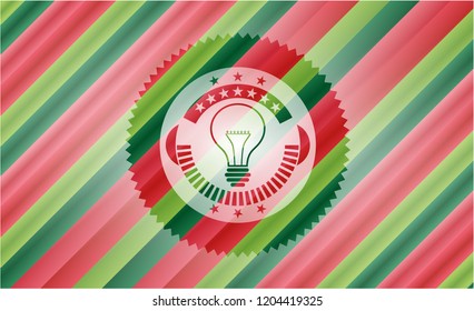 idea icon inside christmas colors badge.