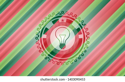 idea icon inside christmas colors style emblem.