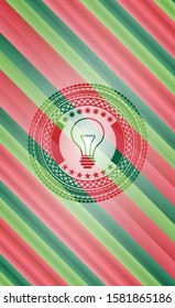 idea icon inside christmas style emblem.
