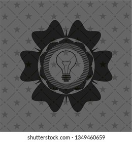 idea icon inside dark emblem. Retro