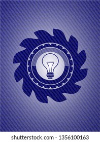 idea icon inside denim background