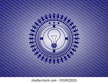 idea icon inside emblem with jean high quality background. 