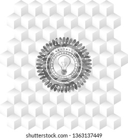 idea icon inside grey badge with geometric cube white background