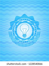idea icon inside light blue water style badge.