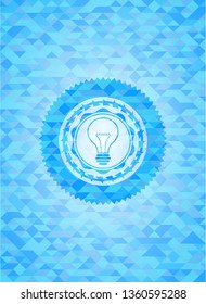 idea icon inside light blue emblem with triangle mosaic background