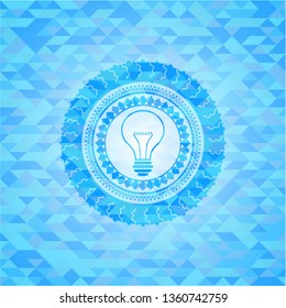 idea icon inside light blue emblem. Mosaic background