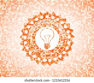 idea icon inside orange mosaic emblem