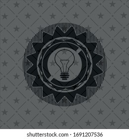 idea icon inside realistic black emblem
