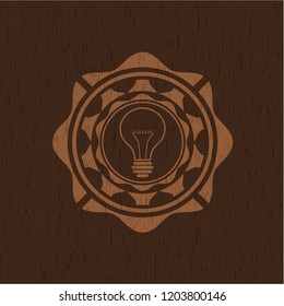 idea icon inside realistic wood emblem
