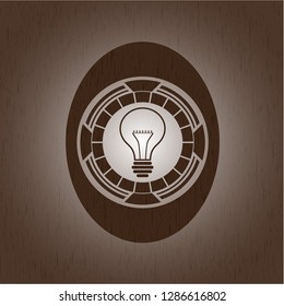 idea icon inside realistic wooden emblem
