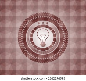 idea icon inside red seamless emblem with geometric pattern background.