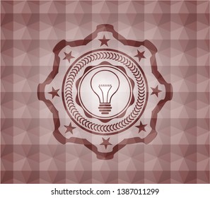 idea icon inside red seamless badge with geometric pattern background.