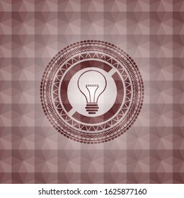 idea icon inside red seamless geometric pattern emblem. Seamless.