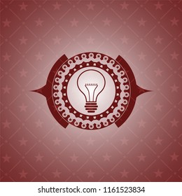 idea icon inside retro red emblem