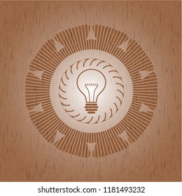 idea icon inside retro wood emblem