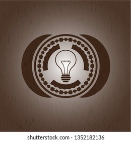 idea icon inside retro wooden emblem