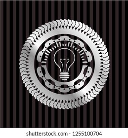 idea icon inside silver badge or emblem