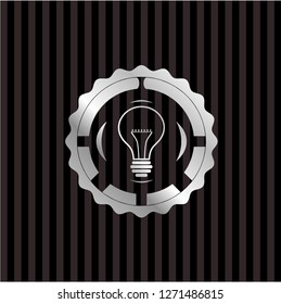 idea icon inside silver emblem or badge