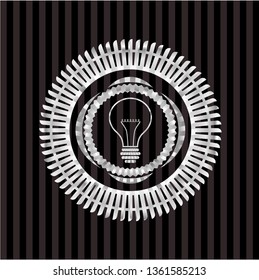 idea icon inside silver emblem or badge