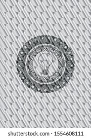 idea icon inside silver shiny badge. Scales pattern. Vector Illustration. Detailed.