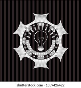 idea icon inside silvery emblem or badge