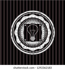 idea icon inside silvery shiny badge