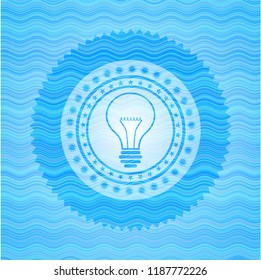 idea icon inside sky blue water style badge.