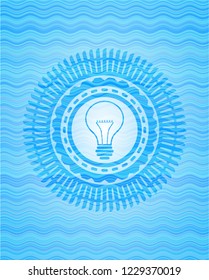 idea icon inside sky blue water wave emblem background.