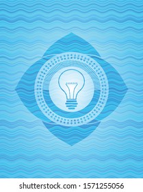 idea icon inside sky blue water style emblem.