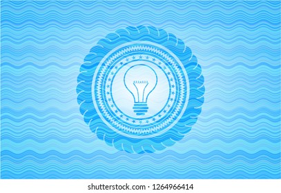 idea icon inside water concept emblem background.