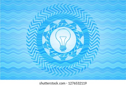 idea icon inside water representation badge.