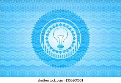 idea icon inside water representation emblem.
