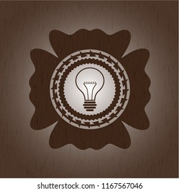 idea icon inside wood emblem