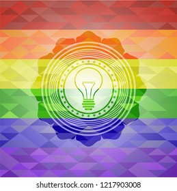 idea icon on mosaic background with the colors of the LGBT flag