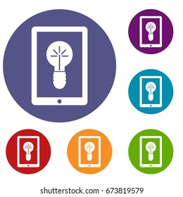 Idea lamp on gadget screen icons set in flat circle reb, blue and green color for web