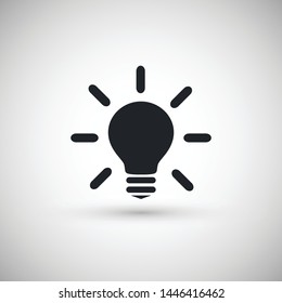 Idea lightbulb icon vector design. Black idea lightbulb icon with realistic drop shadow. 