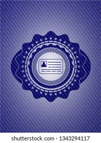 identification card icon inside badge with denim background