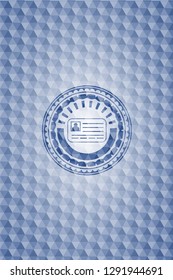 identification card icon inside blue hexagon badge.