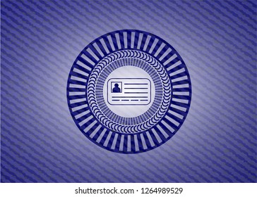 identification card icon inside emblem with denim texture