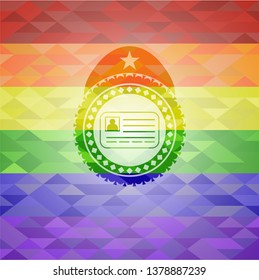 identification card icon inside emblem on mosaic background with the colors of the LGBT flag