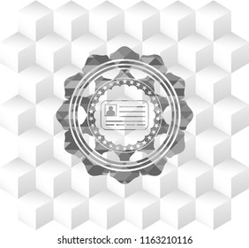 identification card icon inside grey emblem with geometric cube white background