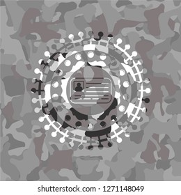 identification card icon inside grey camo texture