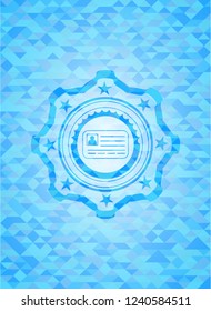 identification card icon inside light blue mosaic emblem