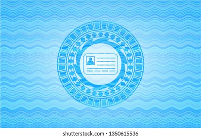 identification card icon inside light blue water wave emblem background.