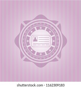 identification card icon inside pink emblem