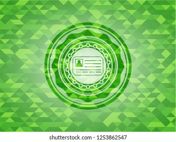 identification card icon inside realistic green mosaic emblem