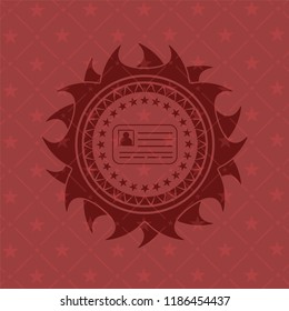 identification card icon inside red emblem